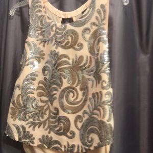 Peach and silver top. Size M designer Astr